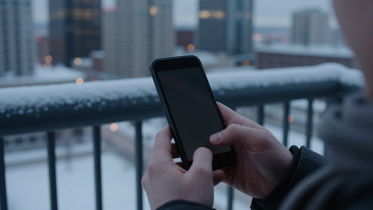 Hands holding a phone on a Calgary balcony for mobile casino play in winter